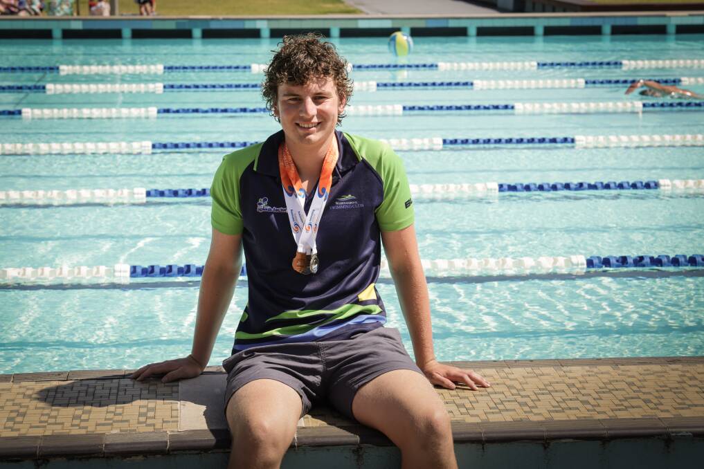 Warrnambool swimmer Fionn Ginley is back winning medals after 12-months of cancer treatment. Picture by Sean McKenna