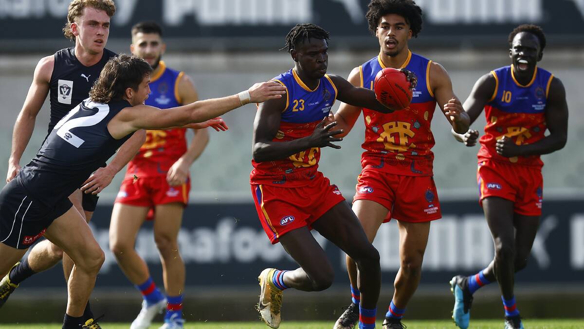 Emmanuel Ajang playing for Fitzroy Cubs this year in a one-off game. Picture by Getty Images