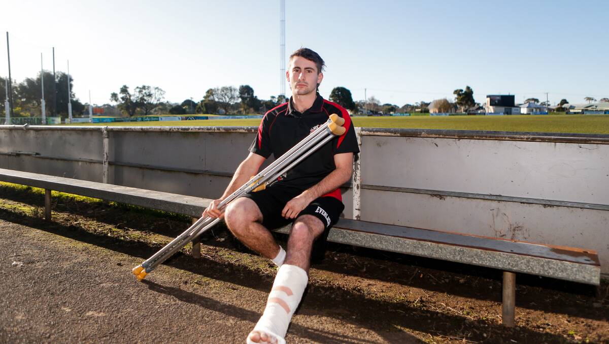 INJURED: Cobden's Ryleigh McVilly broke his fibula and dislocated his left ankle against Port Fairy. Picture: Anthony Brady