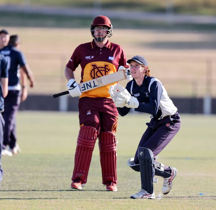 Port Fairy's Max Green receives a throw in the T20 Cup final against Nestles. Picture by Anthony Brady