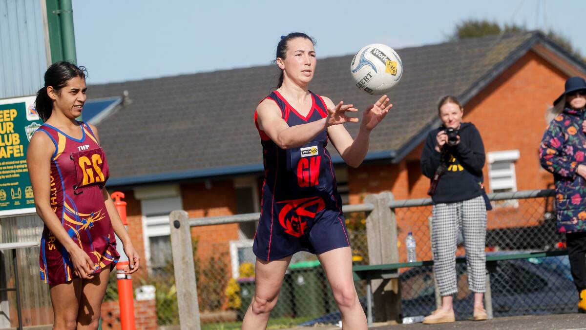 DEFENDER: Tessa Poot looks to move the ball up the court for the Demons. Picture: Anthony Brady