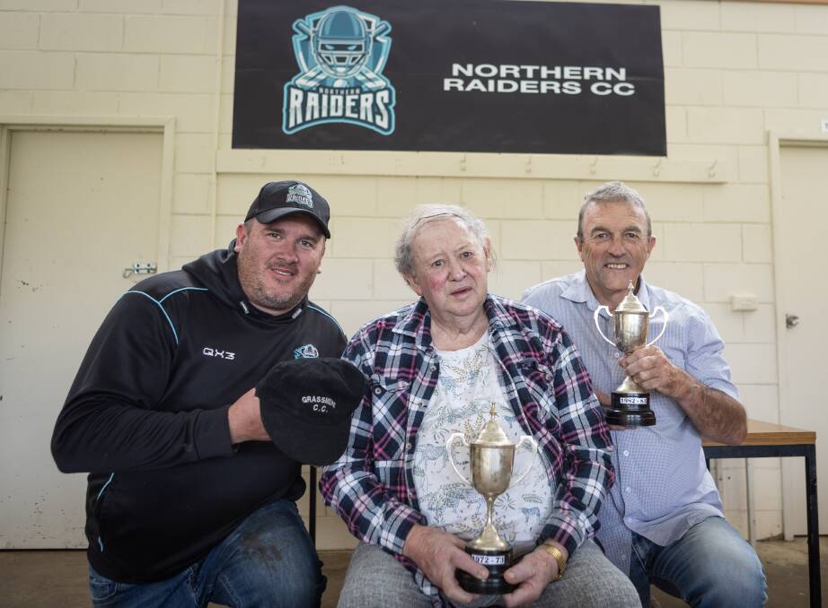 Northern Raiders co-president Peter Harris with Grassmere premiership captains Brian Dunne and Wayne Johnstone. Picture by Anthony Brady