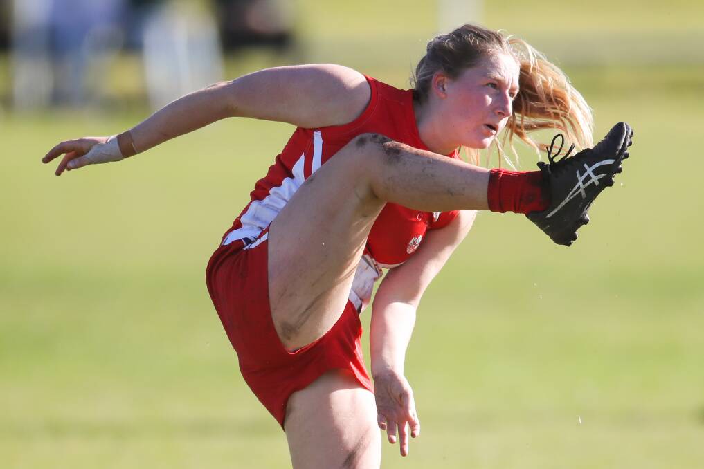 THUD: Maisey Waayers launches the ball forward for South Warrnambool against Tyrendarra. Picture: Morgan Hancock