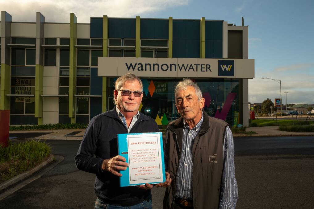 Disappointed: John Konings and David McLean of the Port Fairy Pipeline Supply Support Group say Wannon Water's last-minute withdrawal from the arranged handover was "disrespectful". Picture: Chris Doheny