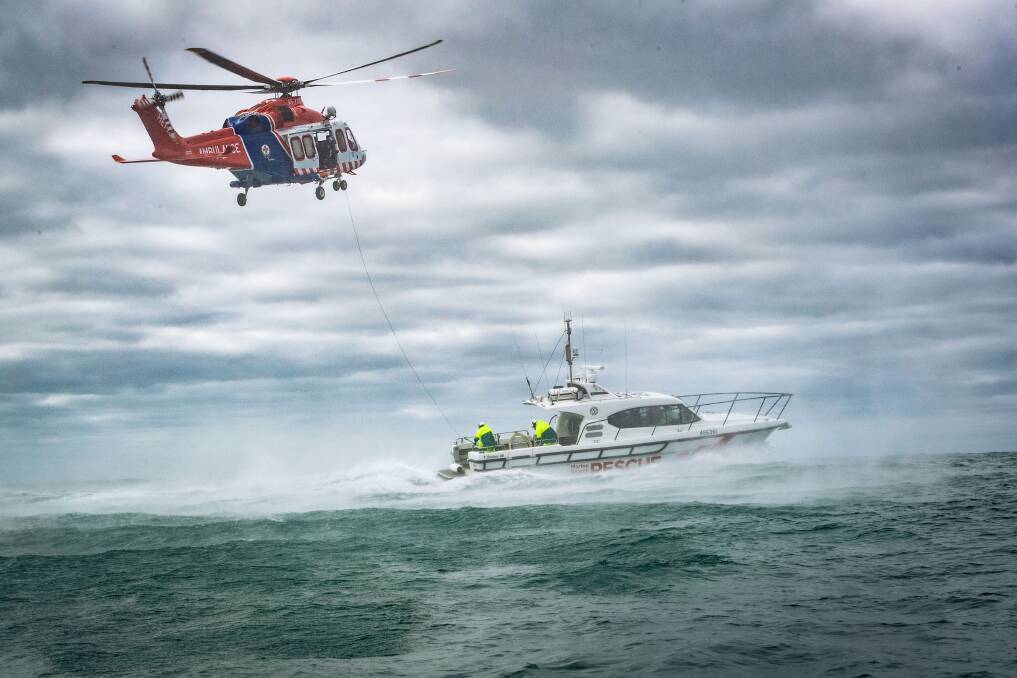 The south-west Helicopter Emergency Medical Service has combined with Port Fairy Marine Rescue Service and Port Fairy Surf Lifesaving Club to practise some life saving skills. Picture by Sean McKenna