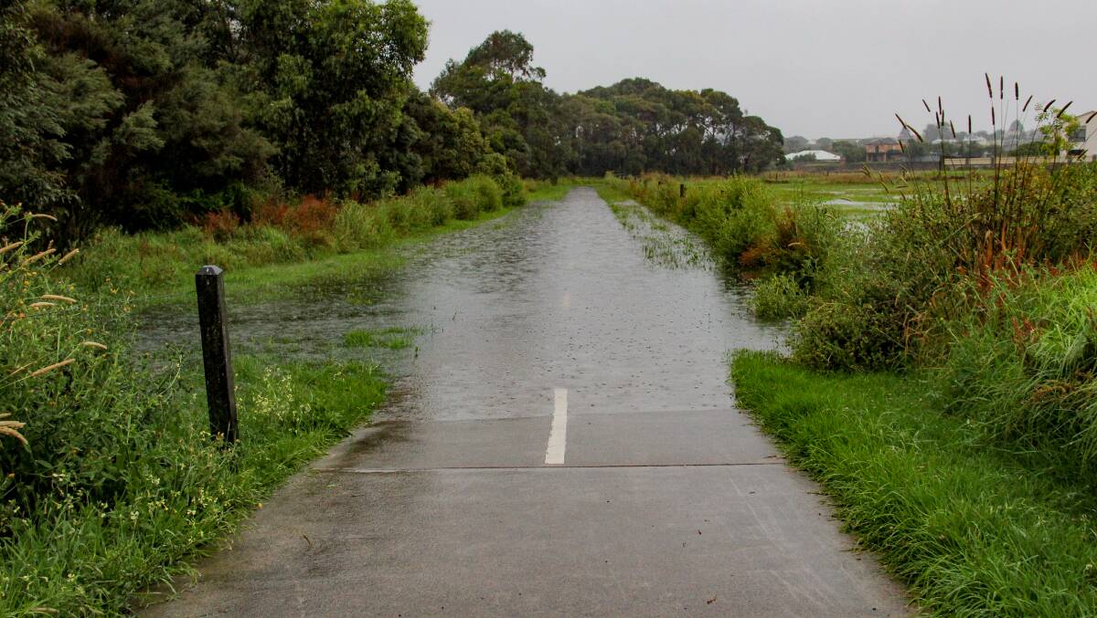 The Russell Creek walking trail at Ardlie Street was cut off in floodwaters on the afternoon of January 7. Picture by Anthony Brady
