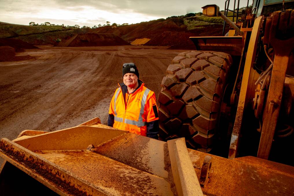 The quarrymen: Loader and crusher operator Greg Jackson is one of the workers who keeps Mortlake's Mount Shadwell quarry churning out scoria day in, day out. Picture: Chris Doheny