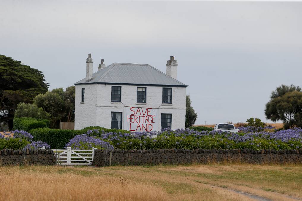 Divisive: Paul Bridgeford's sign on the side of the heritage-listed Woodbine property outside Port Fairy has drawn criticism from the agent selling the surrounding land. Picture: Anthony Brady.