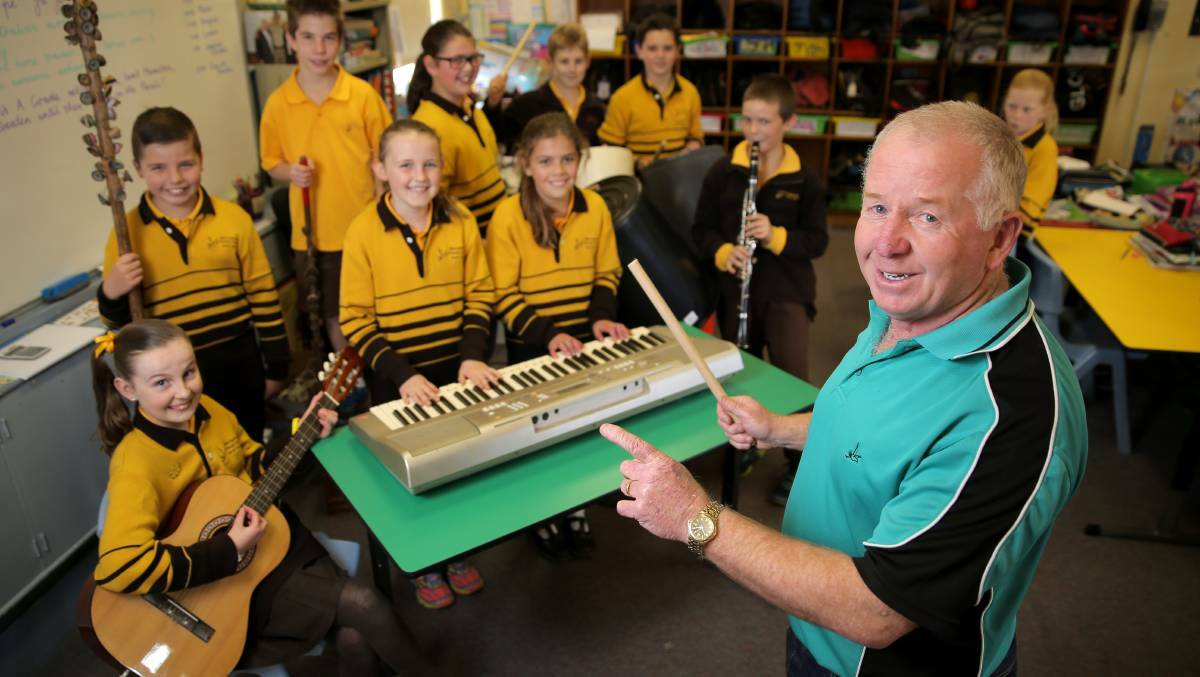 PASSIONATE: Warrnambool Primary School's John Pattison is retired but still occasionally fills in for staff, saying he enjoys teaching music to children.
