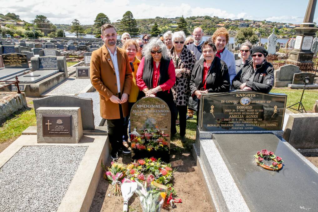 AT LAST: Family members of Uncle Allan McDonald unveil a headstone for the unmarked grave on Remembrance Day. Picture: Chris Doheny