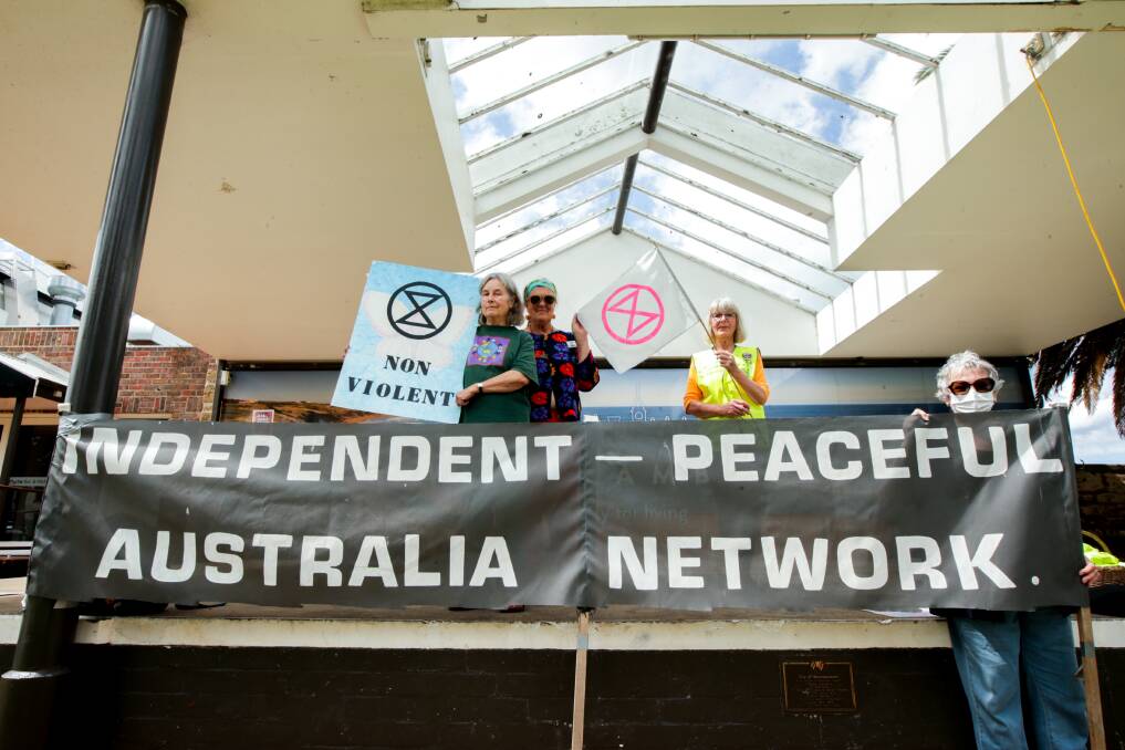 PEACE: South-west residents Cheryl Duffin, from Portland, Gillian Blair, Warrnambool, Julie Hart, Heywood and Pat Nesbitt, Woodford at another rally for Ukraine held early at the Civic Green on Wednesday morning. Picture: Chris Doheny