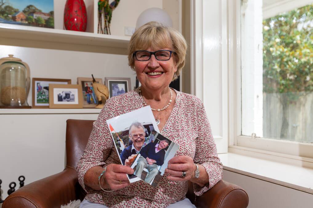 Diana Wilson holding photo of the late James Wilson who will receive an Order of Australia Medal on Australia Day. Picture by Eddie Guerrero.