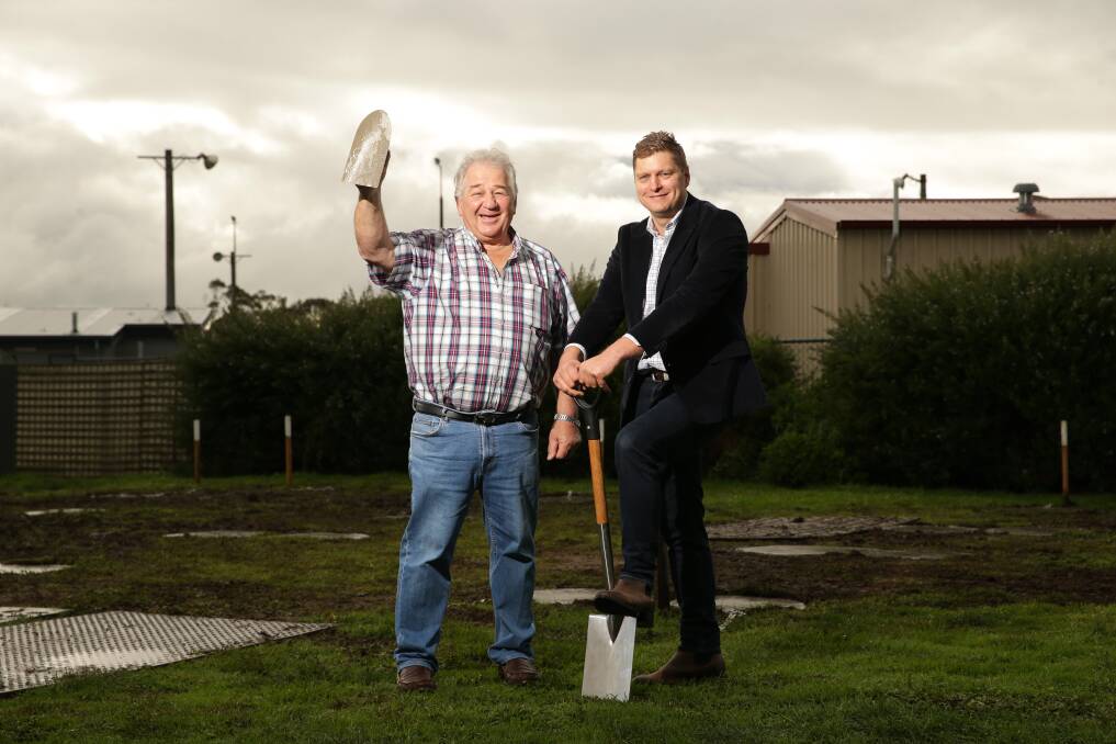 DIGGING DEEP: Moyne Shire councillor Jim Doukas and deputy mayor Daniel Meade at Koroit Caravan Park where five cabins will be constructed to house key workers. Picture: Chris Doheny