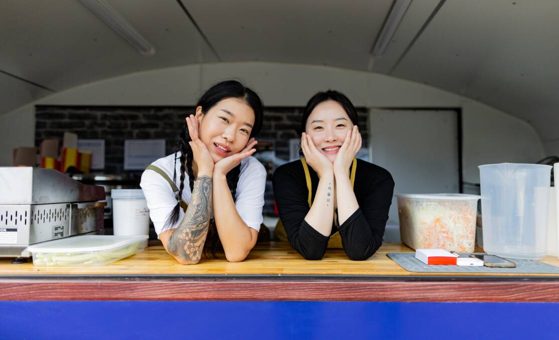 South Korea-born Yelyn Jung and Seoah Jang have opened WARA, a Korean food truck at the old CFA station on Raglan Parade. Picture by Anthony Brady