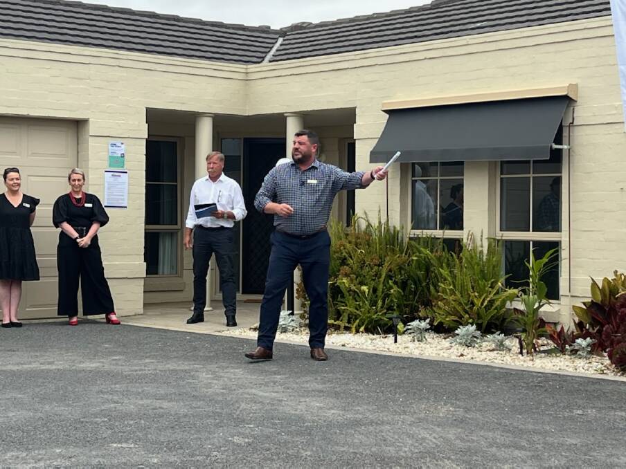 GOOD RESULT: Homeseeka agent Tim Wells at the auction of 3/6 Riverdale Court, which was purchased by a local investor for $530,000.