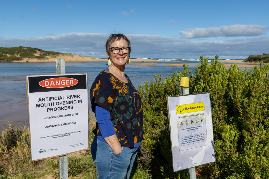 Peterborough resident Barb Mullen is thrilled the Curdies River mouth was opened on Sunday. Picture by Eddie Guerrero
