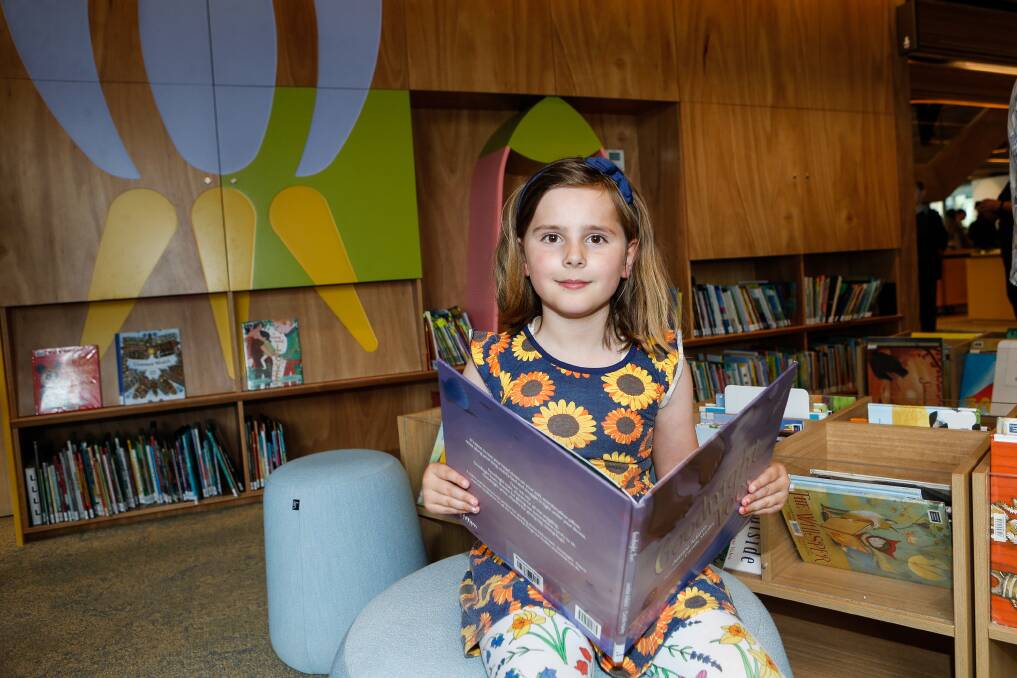 Eight-year-old Maeve Lindsay can't get enough of Warrnambool's new library. Picture by Anthony Brady