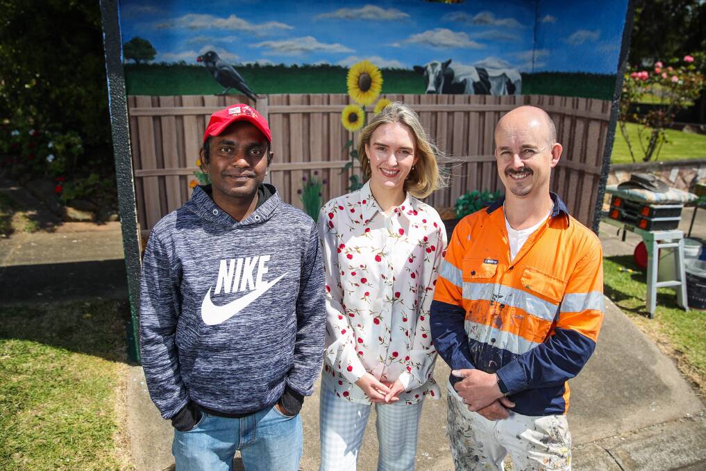 GET CONNECTED: Thiru Somasundara with Warrnambool City Council social connection project worker Jaimee Millar and artist Jimmi Buscombe at the Derby Street bus shelter mural. Picture: Morgan Hancock