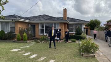 The auction of 14 Patterson Street attracted a large crowd but failed to secure a single bidder. 