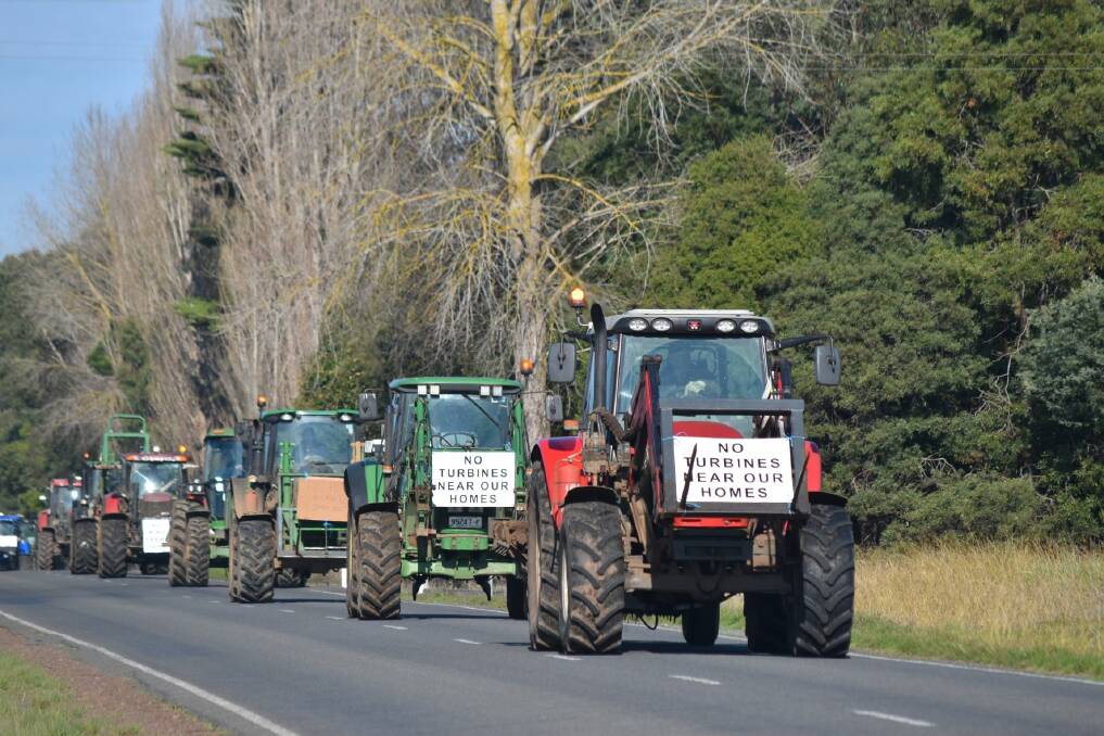 ROLLING IN: About 15 tractors rallied outside Ecklin Community Hall where Mumblin Wind Farm proponents were holding drop-in meetings on Saturday.