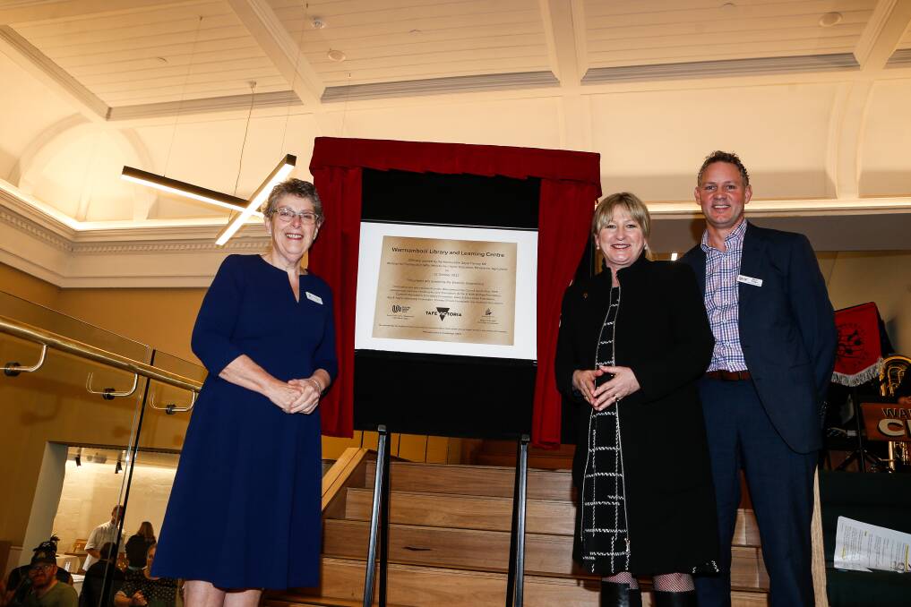 Warrnambool mayor Vicki Jellie, Member for Western Province Gayle Tierney and South West TAFE CEO Mark Fidge unveil a plaque at Warrnambool Library. Picture: Anthony Brady