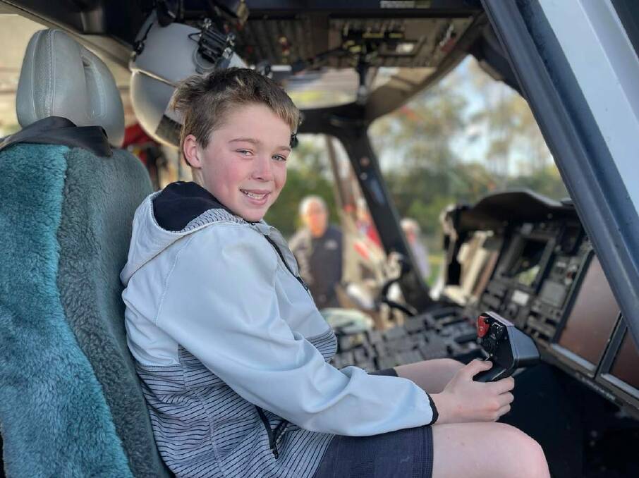 IN CONTROL: Cobden's Rusty Ponting, 13 sits in the pilot's seat of the HEMS 4 at the newly-paved aerodrome.
