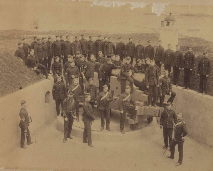 CRACK SHOTS: Militia men at Flagstaff Hill c.1887. The lower lighthouse (still extant) can be seen in the background. Picture: Warrnambool Historical Society