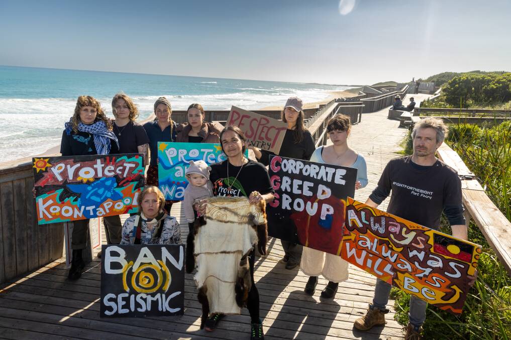 Gunditjmara woman and whale dreaming custodian Yaraan Couzens Bundle (centre) joins members of the Southern Ocean Protection Embassy Collective at the whale-watching platform at Logans Beach, Warrnambool to call for a rally to be held at the breakwater on Sunday, October 22. Picture by Eddie Guerrero