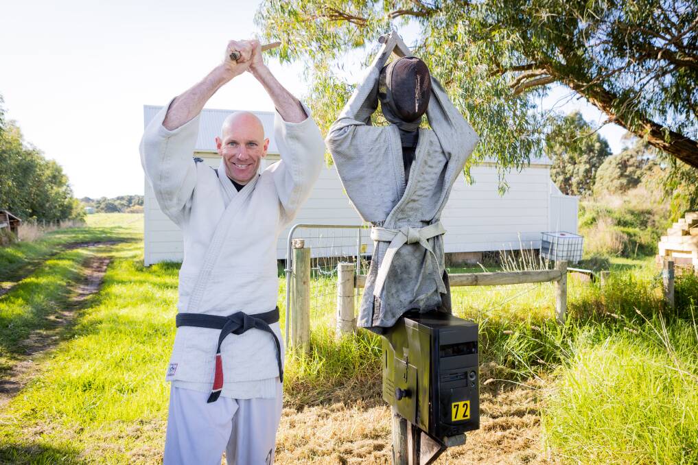 Cudgee's Ted Argyle made his martial arts-inspired mailbox from recycled materials. Picture by Anthony Brady
