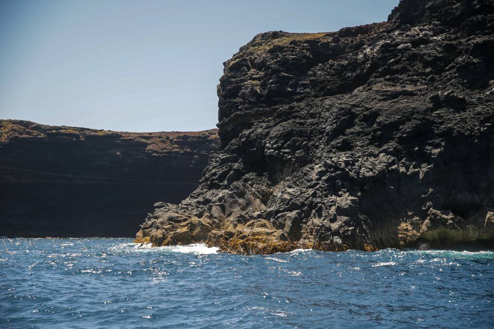 BIG BANG: The island was formed when an underwater volcano erupted about eight million years ago. Strong winds and seas have since carved the land into its distinctive shape. Picture: Chris Doheny