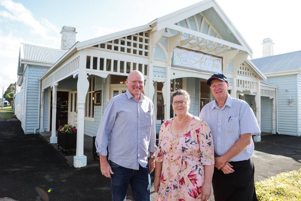 Greg's twin brother Ian, who is helping temporarily, with owners Julie and Greg Lamond outside their new business. Picture by Anthony Brady