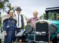 Warrnambool and District Historical Vehicle Club has hosted their 50th anniversary car show at the Fletcher Jones Gardens. Bev and Doug Byron of Allansford stand with their 1927 Oakley Coach, joined by club president Bryan O'Meara. Picture by Sean McKenna.