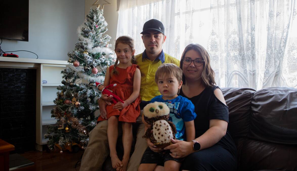Helping hand: Jesse Sutcliffe-Bentley will enjoy Christmas with his family Isabelle, 5, Luca, 3, and partner Melissa Molloy. He will also help other families to do the same. Picture: Emma Stapleton