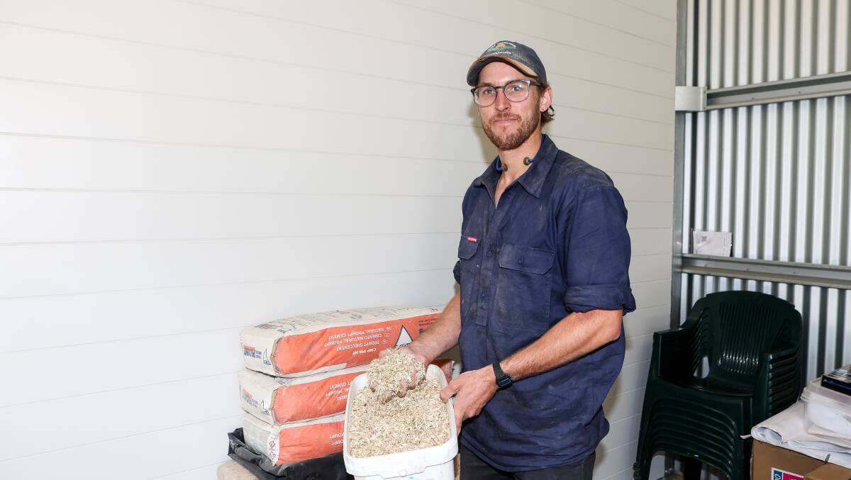 BELOW: Architect and builder Ben Kampschoer showcases what the hempcrete looks like before it is mixed with lime and water and placed into the walls.