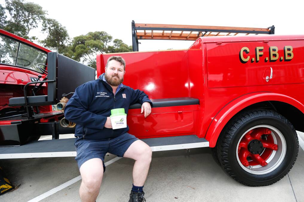FUND-RAISING: Warrnambool Fire Brigade Captain Tom Woodhams along with other emergency services members and volunteers collected money for the Good Friday Appeal on Friday. Picture: Anthony Brady