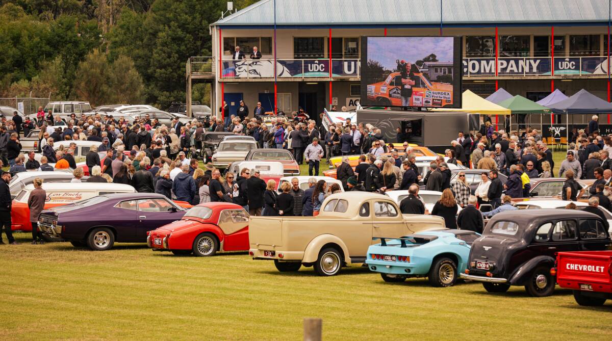 Classic cars formed a guard of honour as mourners farewelled Reg Dumesny at his funeral at Panmure Recreation Reserve on Wednesday. Picture by Sean McKenna