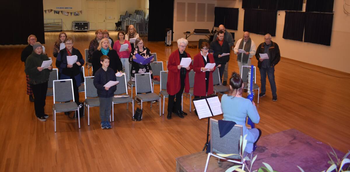 CHOIR: The festival choir learning some songs with vocalist, harpist, choral conductor, horn player and arranger Claire Patti at Theatre Royal Camperdown on Saturday. 