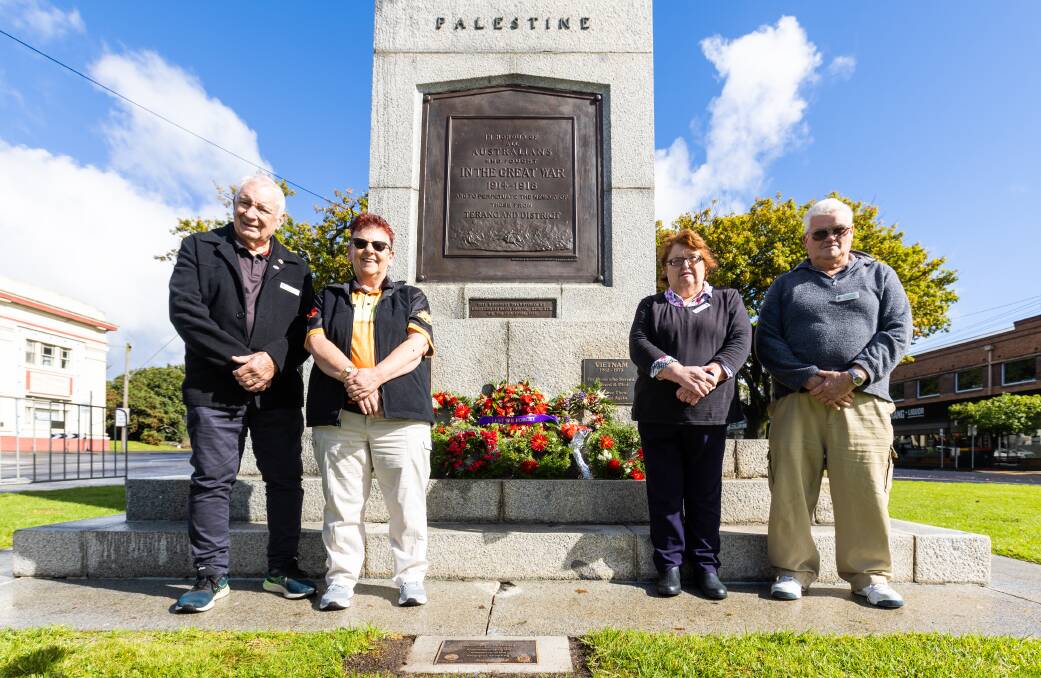 Terang RSL Sub-Branch's Dave Jenkin, Pamela Bell, Liz Bowden and Don Bowden at Terang's War Memorial, where a plaque was unveiled on Saturday to commemorate 100 years since it was unveiled. Picture by Eddie Guerrero