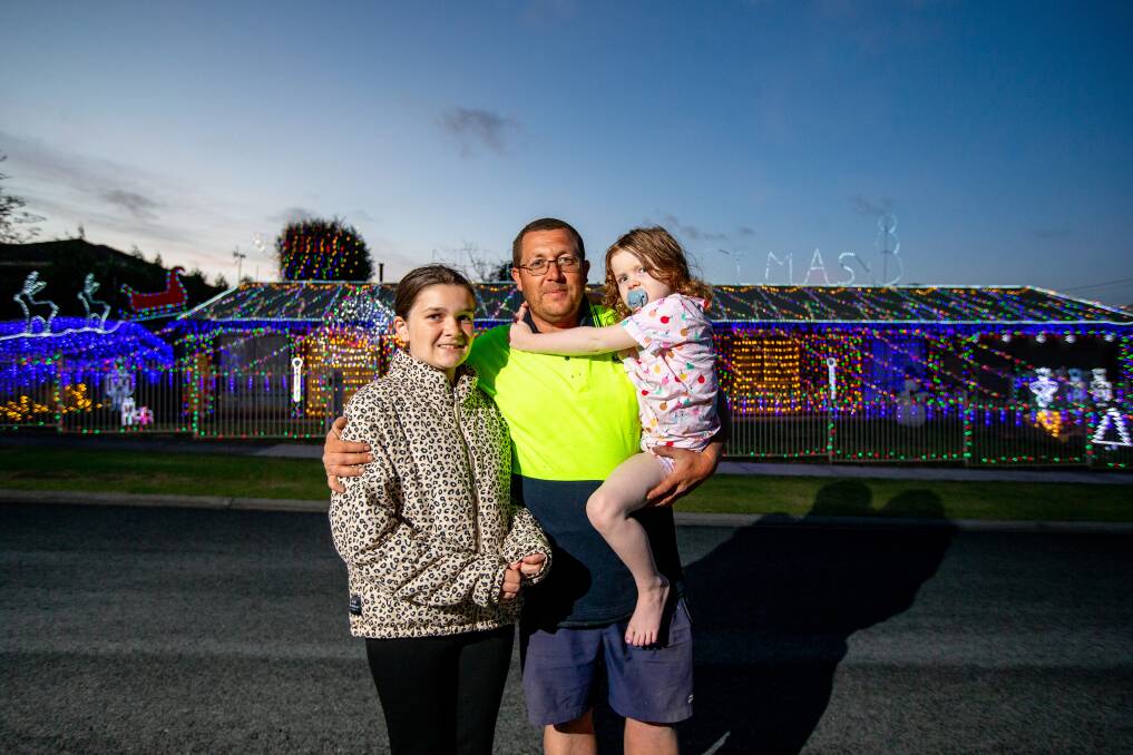 CHRISTMAS LIGHTS: Ava, 13, Jamie, and Harper, 5, Pimblett with their bright Christmas display at Maneroo Court in Warrnambool. Picture: Chris Doheny