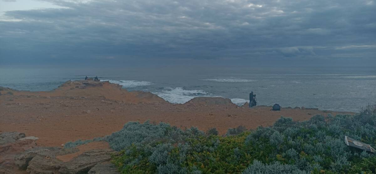 People near the edge of the clifftop at Thunder Point on the evening of August 27.
Warrnambool FRV senior station officer Troy Cleverley said people needed to keep to the marked tracks and away from cliff edges. Photo by Lillian Altman