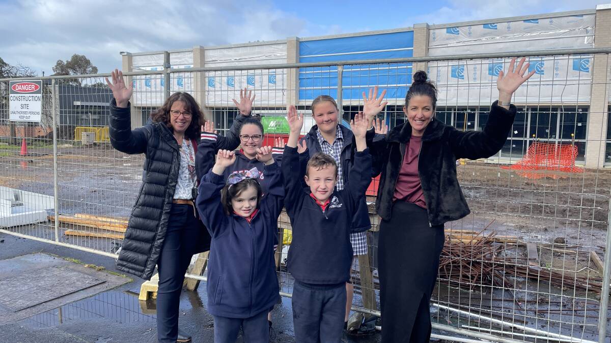 Terang College's Kath Tanner, back left, Gemma Blain, Maddi Wallace and front, Hampden Specialist School's Zoe Meade, Oscar McLeod and Kylie Carter, are excited about the Strong Street campus. Picture by Lillian Altman