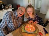 Neil celebrating one of his birthdays with his granddaughter Annabelle Sander.