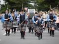 Warrnambool Pipe Band kick off proceedings by leading fans to the festival gates.  Pictures by Sean McKenna.
