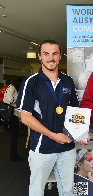 Portland's Jayme Cannon holding his gold medal prize in carpentry at the WorldSkills National Championships and Skills Show in Melbourne on August 20, 2023. Picture supplied