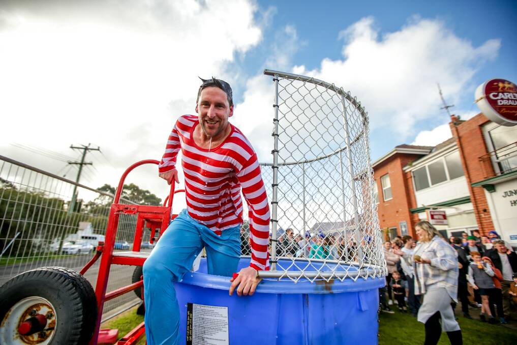 Hundreds of dollars were bid on being the one to dunk Allansford identities into an ice-cold tank of water for charity