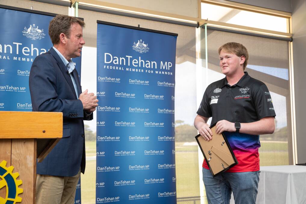 Portland BMX rider Jack Thorp (right) receives his achievement award from member for Wannon Dan Tehan. Picture by Sean McKenna