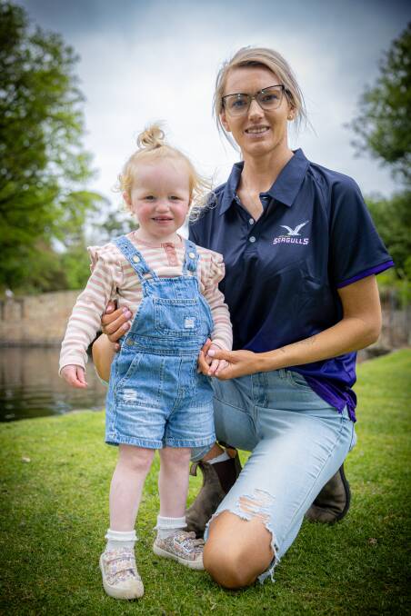 Port Fairy recruit Rebecca Mitchell with daughter Brydie, 2, at Warrnambool Botanical Gardens. Picture by Eddie Guerrero