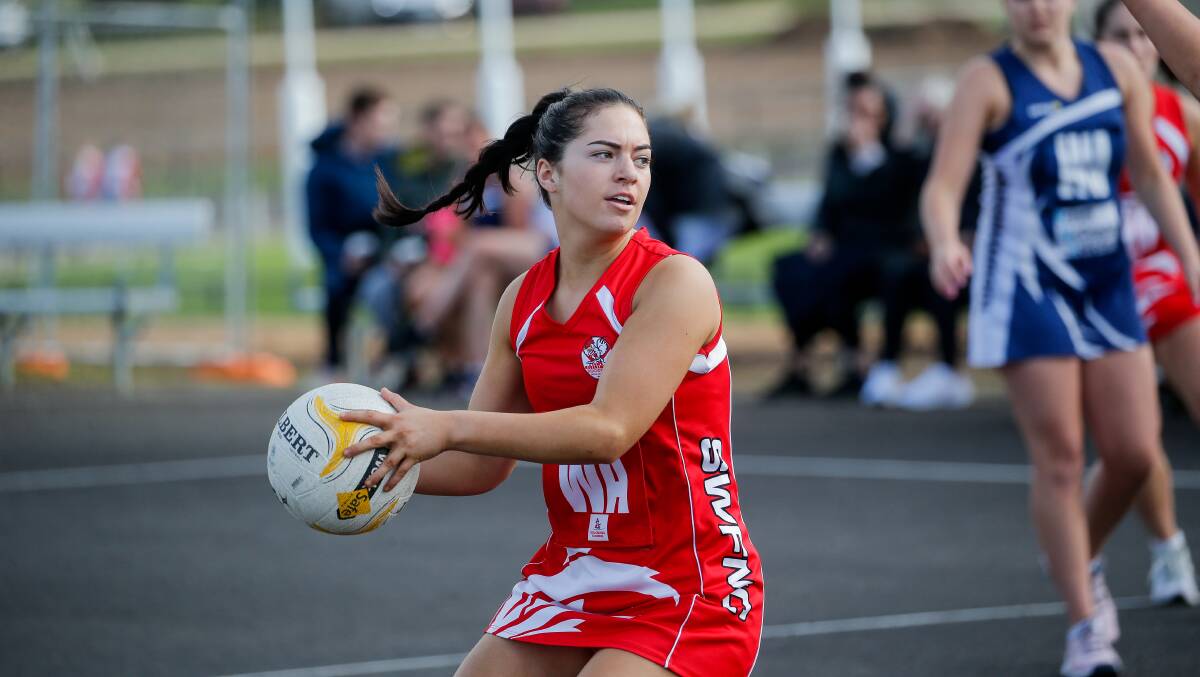 DETERMINED: South Warrnambool wing attack Isabella Rea moves the ball into the Roosters' attack. Picture: Anthony Brady