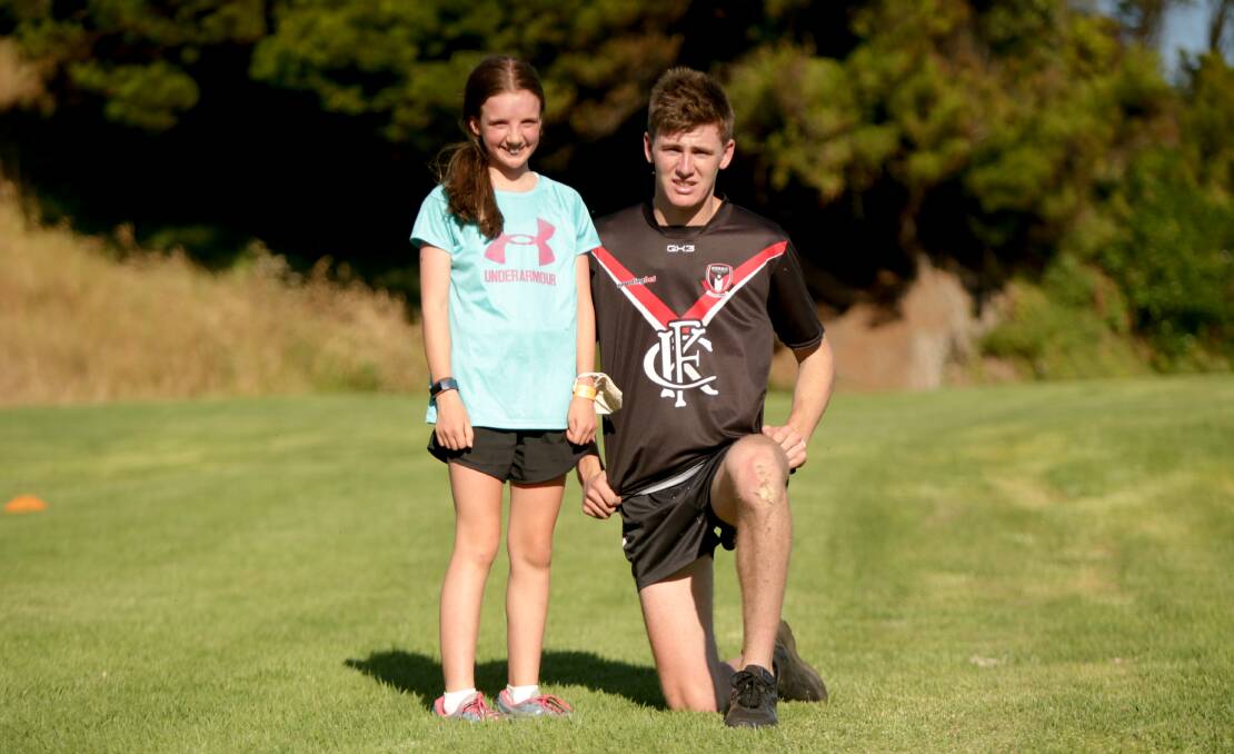 YOUNG GUNS: Rose Jarvis, 12 and Tom Baulch, 18 following the Flaggy 5 run. Picture: Chris Doheny