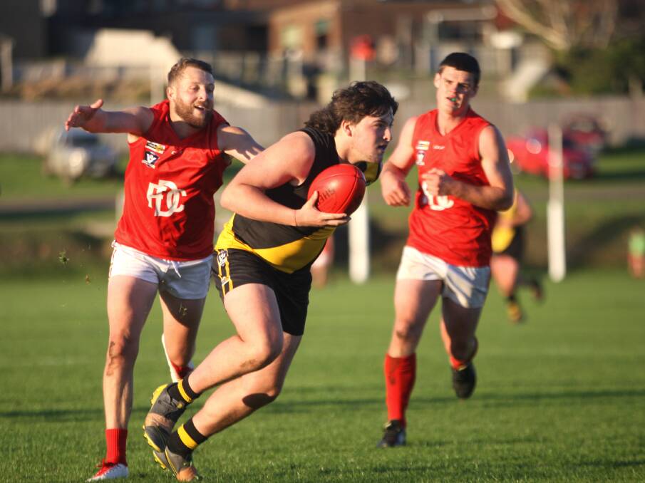 EDGING AHEAD: Merrivale's Jesse Mahony-Gilchrist breaks away with the football in his team's forward 50. Picture: Meg Saultry